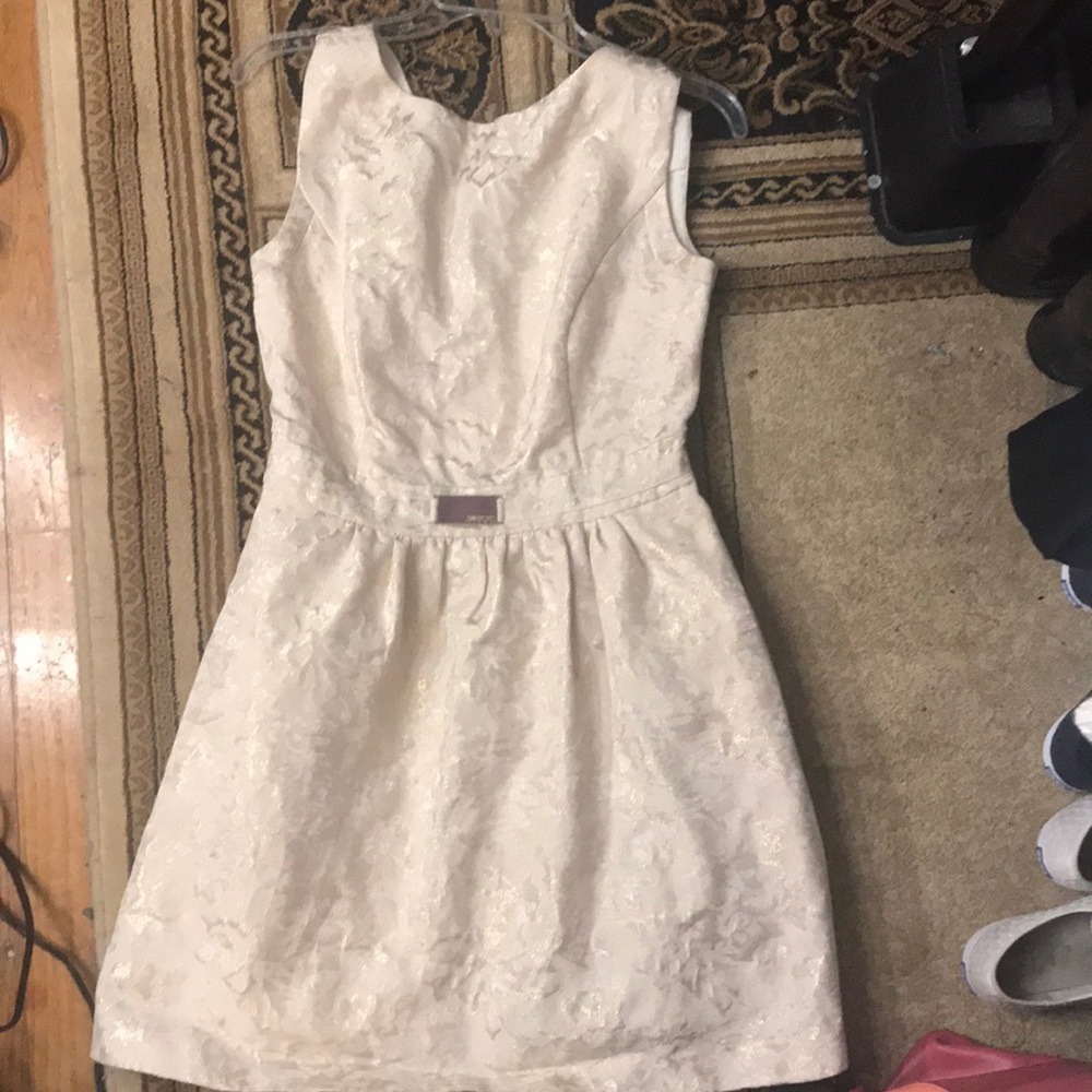 Cream and gold v back dress